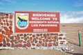 Welcome sign for the visitors of the colony of Magellanic penguins on Magdalena Island, during a sunny day.