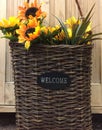 Welcome sign on woven basket Royalty Free Stock Photo