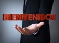 Welcome in spanish over businessman