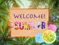 Welcome summer sign with abstract tropical tree background Royalty Free Stock Photo