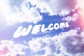 Welcome. Text from clouds in sky in bright sunlight. Royalty Free Stock Photo