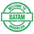 WELCOME TO BATAM - INDONESIA, words written on green stamp