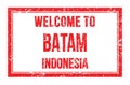 WELCOME TO BATAM - INDONESIA, words written on red rectangle stamp