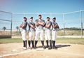 Welcome to the big leagues. Portrait of a group of confident young men playing a game of baseball.