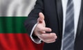 Welcome to the Bulgaria. Hand on Bulgarian flag background. Business, politics, cooperation and travel concept Royalty Free Stock Photo