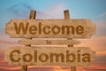 Welcome to Colombia sing on wood background