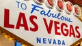 Welcome to fabulous Las Vegas retro neon sign in gambling tourist resort, USA. Iconic vintage glowing banner, symbol of casino,