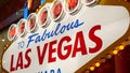 Welcome to fabulous Las Vegas retro neon sign in gambling tourist resort, USA. Iconic vintage glowing banner, symbol of casino, Royalty Free Stock Photo
