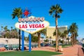 Welcome to Fabulous Las Vegas sign on a bright sunny day. Background Mandalay Bay Resort and Casino tower on Las Vegas Boulevard Royalty Free Stock Photo