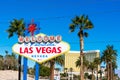 Welcome to Fabulous Las Vegas sign at The Strip on a bright sunny day. Mandalay Bay Resort and Casino tower in background Royalty Free Stock Photo