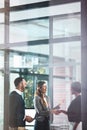 Welcome to the firm. businesswomen shaking hands in a modern office. Royalty Free Stock Photo