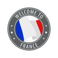 Welcome to France. Gray stamp with a waving country flag