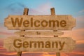 Welcome to Germany sing on wood background Royalty Free Stock Photo