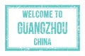 WELCOME TO GUANGZHOU - CHINA, words written on turquoise rectangle stamp Royalty Free Stock Photo