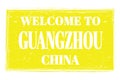 WELCOME TO GUANGZHOU - CHINA, words written on yellow stamp Royalty Free Stock Photo