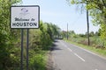 Welcome to Houston sign greeting rural village town entrance road post countryside Renfrewshire Scotland
