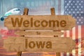 Welcome to Iowa state in USA sign on wood, travell theme Royalty Free Stock Photo