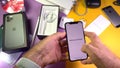 Welcome to iPhone message POV man hand unboxing unpacking highly acclaimed new