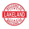 Welcome to LAKELAND. Impression of a round stamp with a scuff. Flat style Royalty Free Stock Photo