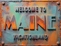 Welcome to Main Rusted Street Sign