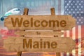 Welcome to Maine state in USA sign on wood, travell theme Royalty Free Stock Photo