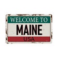 Welcome to Maine vintage rusty metal sign on a white background, vector illustration Royalty Free Stock Photo