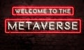 Welcome To The Metaverse Neon Sign On Grunge Brick Wall