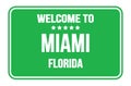 WELCOME TO MIAMI - FLORIDA, words written on green street sign stamp Royalty Free Stock Photo