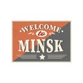 Welcome to Minsk sign on a white background rusted metal tin plate