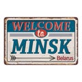 Welcome to Minsk sign on a white background rusted metal tin plate