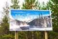 Welcome to Montana road sign featuring state map and winter landscape Royalty Free Stock Photo