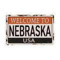 Welcome to Nebraska vintage rusty metal sign on a white background, vector illustration