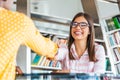 Welcome to our team! Young modern business woman in smart casual wear shaking hands while working in the creative office. Business Royalty Free Stock Photo