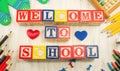 Welcome to school written in wooden cubicle letters