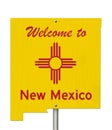 Welcome to the state of New Mexico road sign in the shape of the state map with the flag