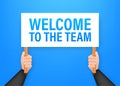 Welcome to the team. Cartoon poster with hand holding placard for banner design. Banner, Billboard design. Vector stock Royalty Free Stock Photo