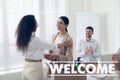 Welcome to team. Employee shaking hands with intern in office Royalty Free Stock Photo