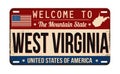 Welcome to West Virginia vintage rusty license plate Royalty Free Stock Photo