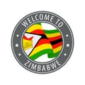 Welcome to Zimbabwe. Gray stamp with a waving country flag.