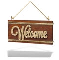 Welcome vintage brown rusty wooden sign on a white background Royalty Free Stock Photo