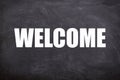 Welcome white text with blackboard background. (welcome and Hello)