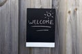 Welcome written on a chalkboard Royalty Free Stock Photo