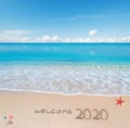 Welcome 2020 written on the sand Royalty Free Stock Photo