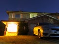 Welcoming home at night with parked car Royalty Free Stock Photo