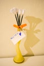 A welcoming present received from children, white paper flowers with love message