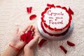 Welcoming womanhood with a period party. First period party cake. Menarche Royalty Free Stock Photo