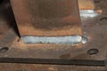 Weld joint joining two metal parts. welding seam. on steel sheet metal. Royalty Free Stock Photo