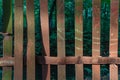A fence made of rusty metal bands Royalty Free Stock Photo