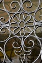 Welded forged decorative aged rusty metal grid grille fence gate detail Royalty Free Stock Photo