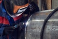 Welder, arc welding and weld seam close-up Royalty Free Stock Photo